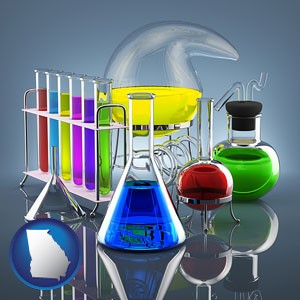 colorful chemicals in chemical laboratory vessels - with Georgia icon