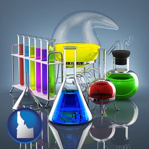 colorful chemicals in chemical laboratory vessels - with Idaho icon