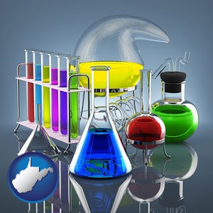 colorful chemicals in chemical laboratory vessels - with West Virginia icon